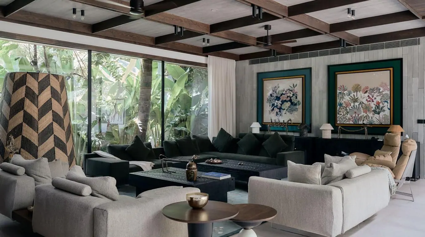 SHANTI living room opening to a lush garden