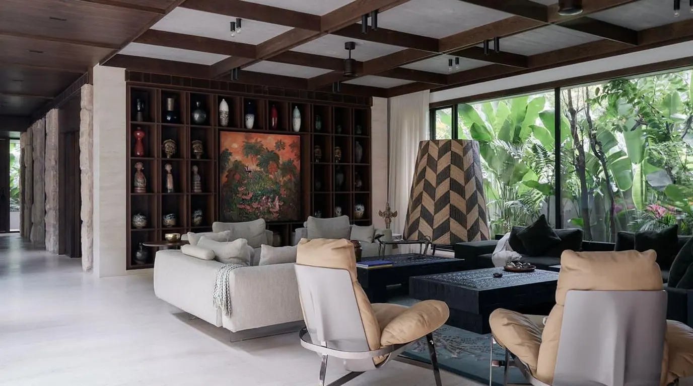 SHANTI living room with timber ceiling and garden views